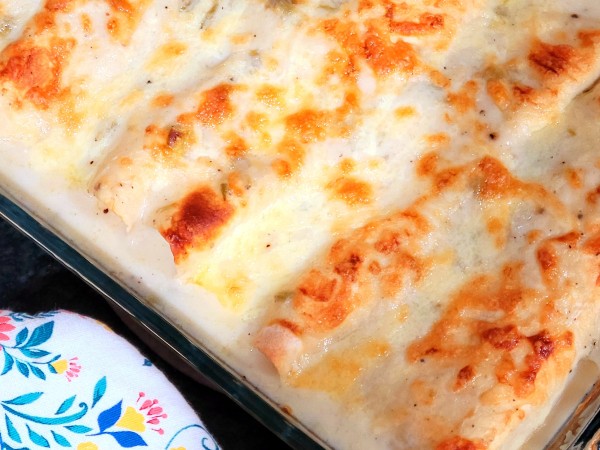 White Chicken Enchiladas with Creamy Green Chili Sauce