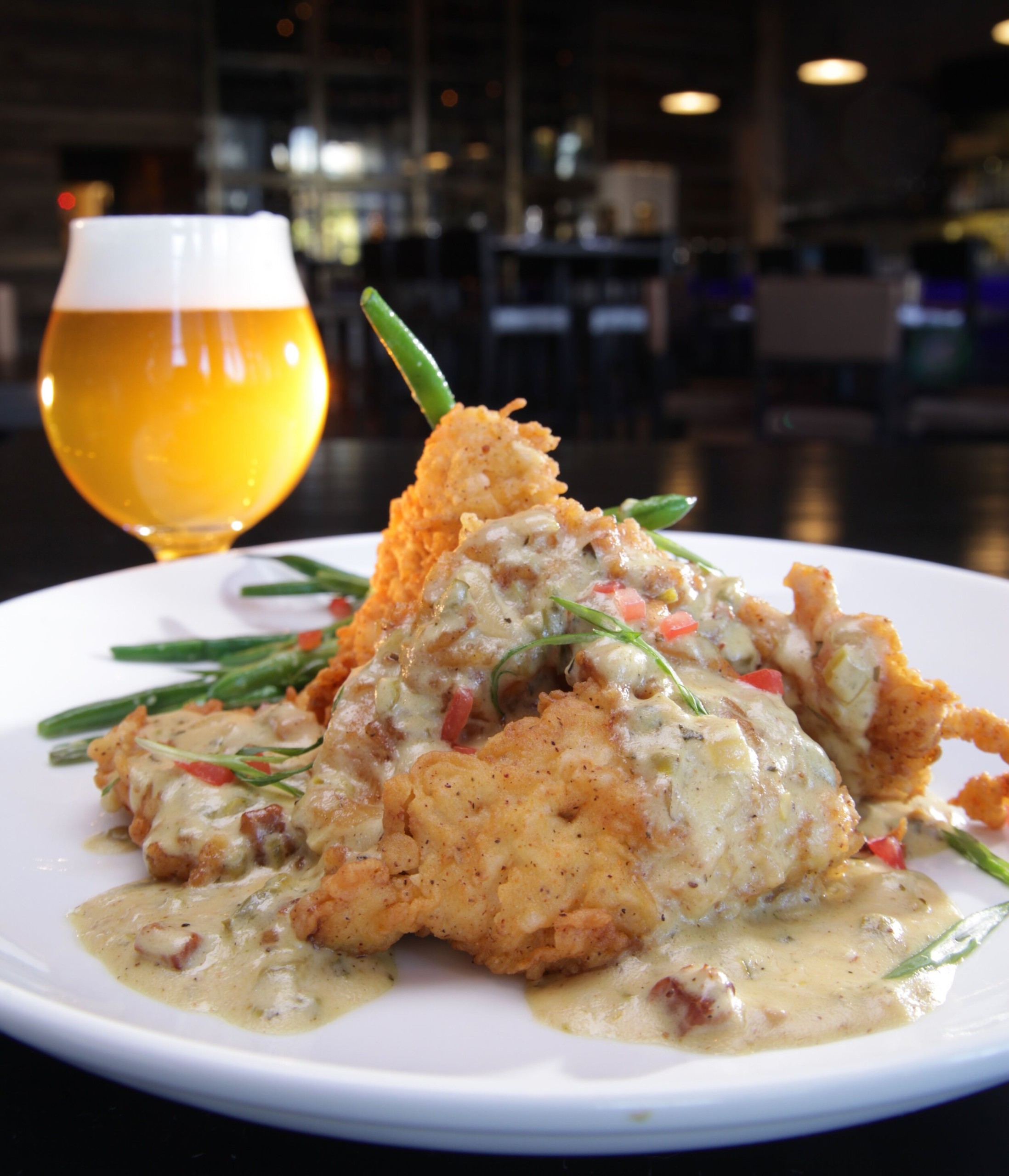 Southern Fried Chicken with Buttermilk Mash and Smoked Jalapeno Gravy at SecretoPhoto Credit: Secreto Southern Kitchen and Bar