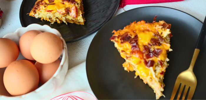 Springer Mountain Farms Cheesy Chicken and Egg Casserole — gluten-free breakfast bake with shredded chicken, eggs, sweet potatoes, cheddar cheese, and crispy bacon.
