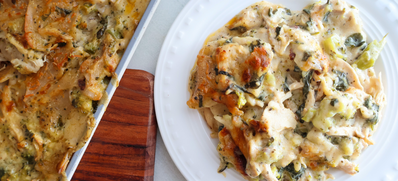 Creamy chicken and broccoli sheet pan lasagna served on a white plate – easy weeknight baked chicken pasta dinner