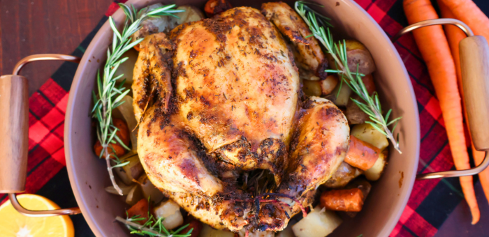 Springer Mountain Farms Citrus Roasted Whole Chicken — oven-roasted whole chicken with orange slices, rosemary, and root vegetables for a tender, flavorful dinner.