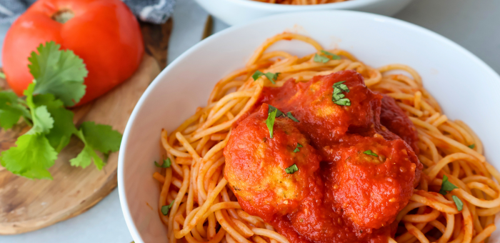 Italian chicken meatballs in marinara sauce served over spaghetti — tender and flavorful freezer-friendly chicken meatballs made with Springer Mountain Farms ground chicken.