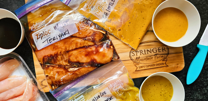 Freezer meal marinated chicken tenders in labeled bags using Springer Mountain Farms chicken.