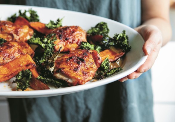 Paprika Chicken With Sweet Potatoes And A Crispy Kale Crown in the plate