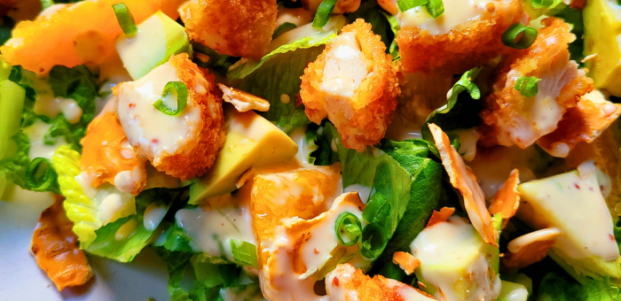 Citrus chicken salad with crispy fully cooked gluten free breaded chicken and spicy honey mustard dressing